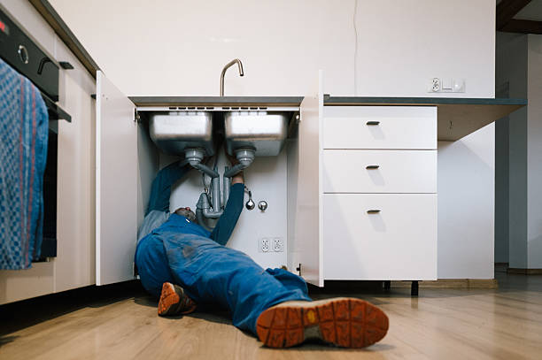 Professional Drain Cleaning technician working in Wilson, AR